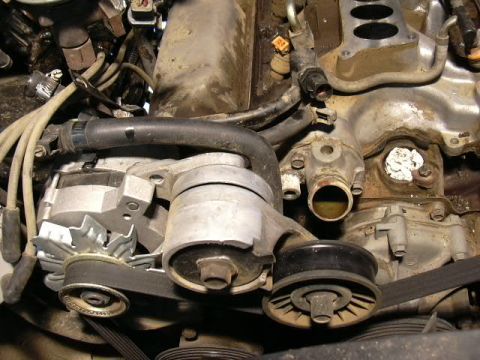 1991 Ford Bronco - Distributor out. Look at how dirty everything is.