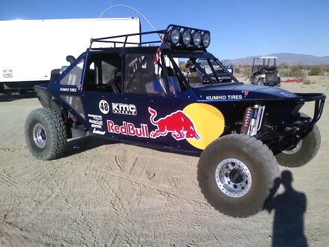 1989 Ford Bronco - This custom off-road buggy features prominent Red Bull sponsorship graphics and large all-terrain tires.