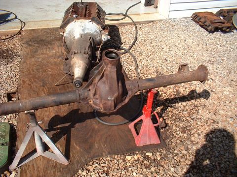 1955 Ford Thunderbird - This image shows a disassembled engine and rear axle assembly, likely for repair or restoration.