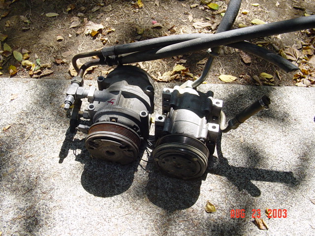 Compressor comparison, new (to me) '88 pump on the left, seized '89 pump on the right