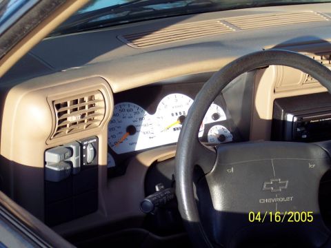 1986 Ford Bronco - Interior view of a Chevrolet vehicle's dashboard, showing the steering wheel and gauges.