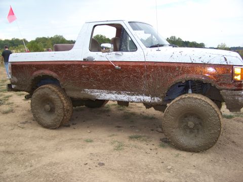 1989 Ford Bronco - This 1989 Ford Bronco is heavily covered in mud after off-roading.