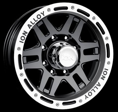 1995 Ford Bronco - A black ION Alloy wheel with a machined outer lip and beadlock-style ring, featuring an 8-spoke split design and a chrome 'ION' center cap.…