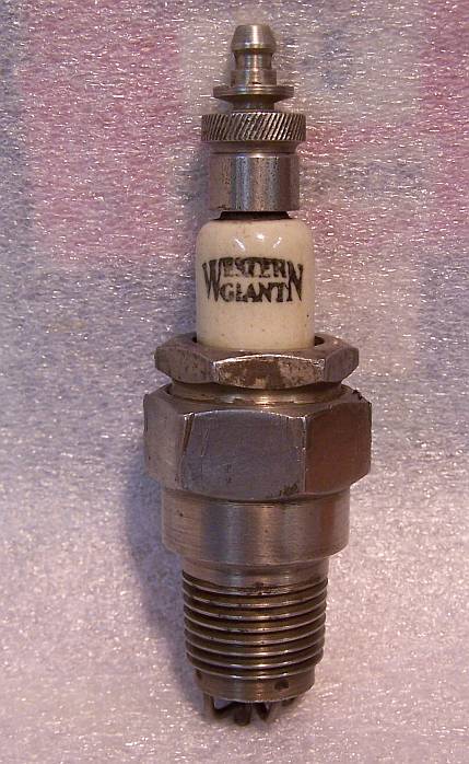 1915 Ford Model T - A vintage Western Giant spark plug is shown, its distinctive branding on the insulator.