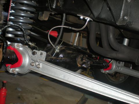 1978 Ford Bronco - Close-up view of the undercarriage, focusing on suspension and exhaust components.
