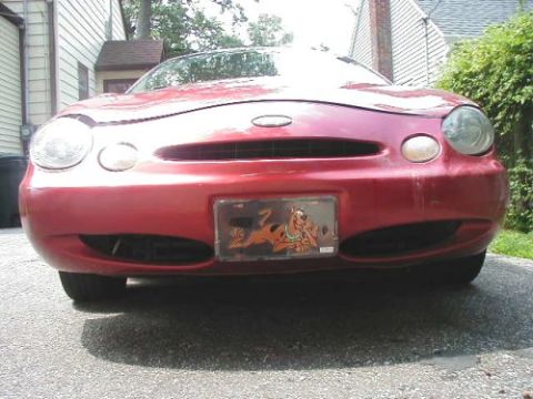 1997 Ford Taurus - This 1997 Ford Taurus is shown from the front, a custom license plate frame.