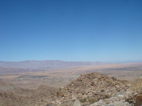 1992 Ford Bronco - View of a desert valley with mountains under a clear blue sky.