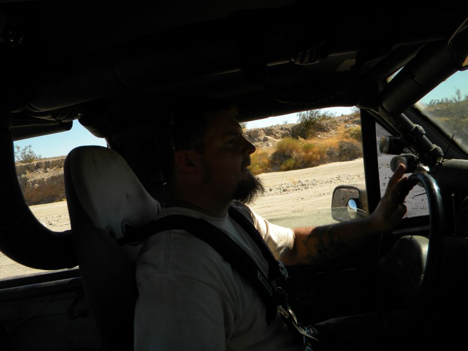 Interior view of 1992 Ford Bronco with driver, off-road