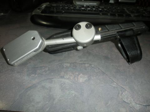 1996 Ford Bronco - Unidentified automotive part shown on a desk surface with a keyboard in the background.