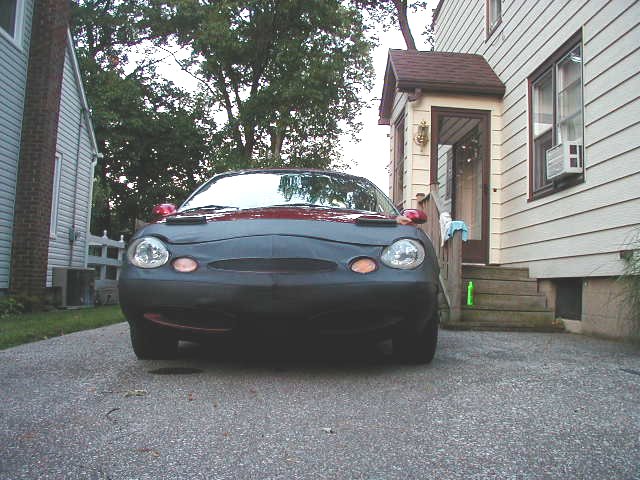 1997 Ford Taurus front view with car cover