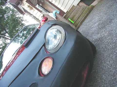 1997 Ford Taurus - Front view of a car with a bra installed, obscuring most of the front end details.