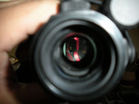 1996 Ford Bronco - Looking through the lens of a scope reveals a distorted view of the surroundings.