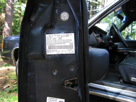 1991 Ford LTD Crown Victoria - Door jamb sticker on a 1991 Ford Crown Victoria LTD shows VIN and build information.