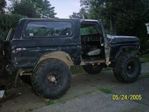 1978 Ford Bronco - This 1978 Ford Bronco is modified with large off-road tires and has its doors removed.