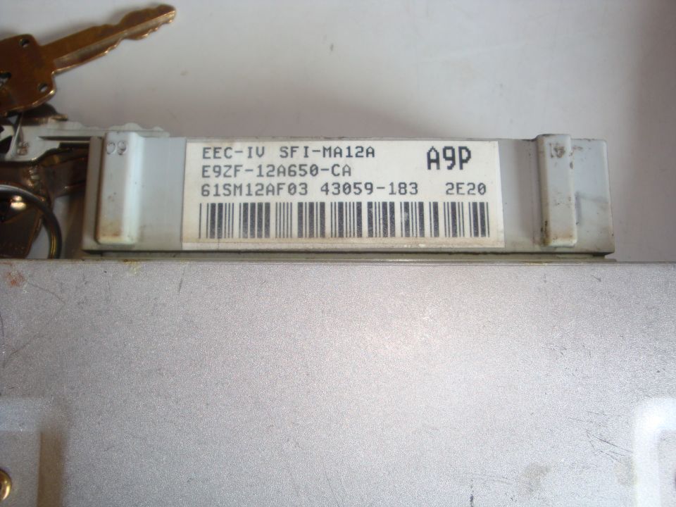 Ford EEC-IV ECU label reading E9ZF-12A650-CA with A9P strategy code