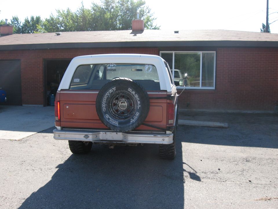 1981 Ford Bronco rear view with spare tire mounted on the tailgate