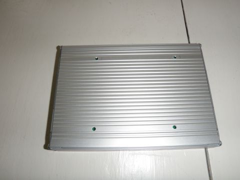 2007 Dodge 2500 - This is a silver electronic component with a ribbed casing and green indicator lights, not a 2007 Dodge 2500.