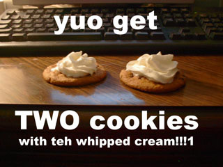 1995 Ford Bronco - A humorous image of two cookies topped with whipped cream, placed before a computer keyboard.