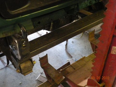 1989 Ford Bronco - This photo shows a close-up view of a vehicle's frame and suspension components during a modification process of modification.