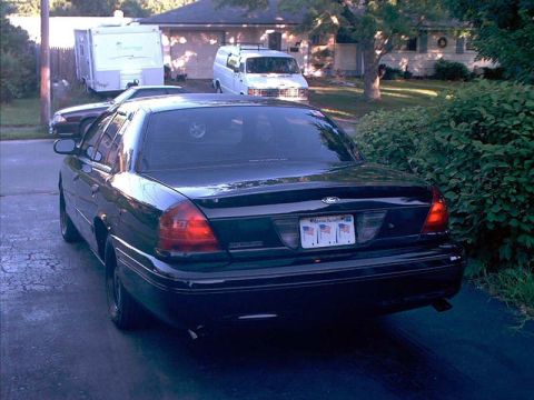 2000 Ford Crown Victoria - Marauder rear decklid spoiler, custom made chrome tips, rear LED lights.
