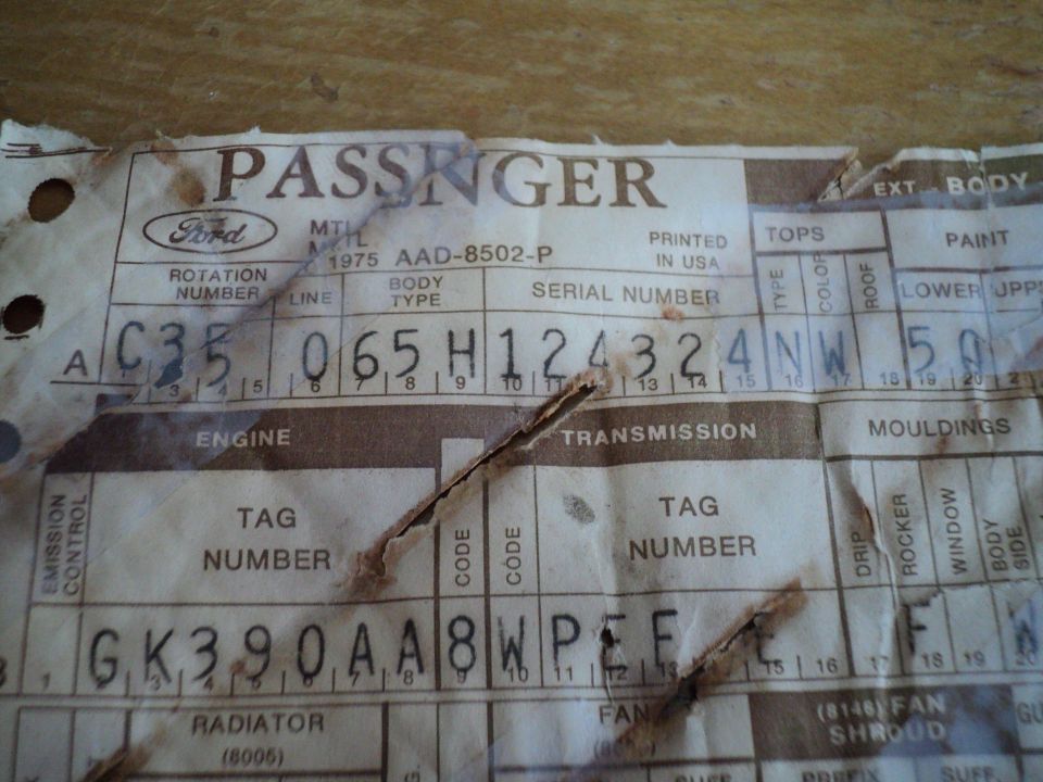 Stained 1975 Ford passenger broadcast sheet showing body type, serial and engine tag codes