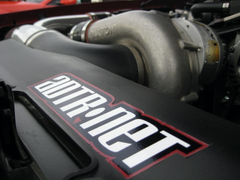 1992 Ford Crown Victoria - Close-up of a Paxton supercharger in a vehicle's engine bay, a prominent sticker.