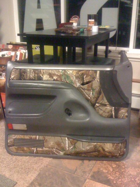 1993 Ford Bronco - Car door panel with camouflage vinyl wrap.