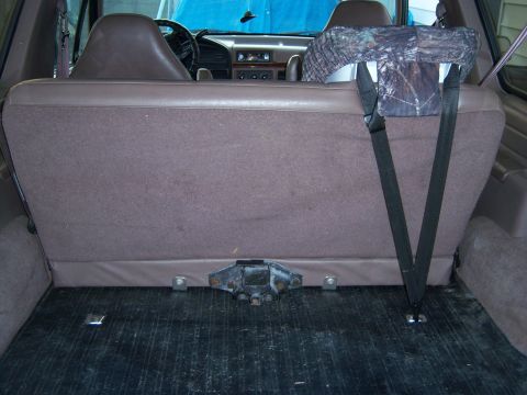 1996 Ford Bronco - Rear interior view of a 1996 Ford Bronco, highlighting the seats and cargo space.
