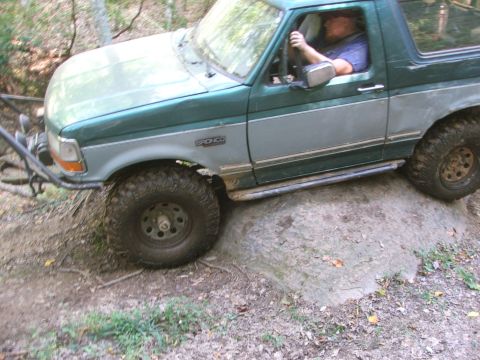 1996 Ford Bronco - This 1996 Ford Bronco navigates a rocky trail, its off-road capabilities.