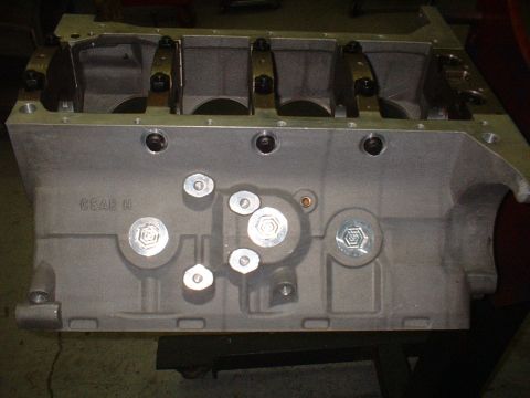 1965 Shelby Cobra - Close-up view of an engine block, likely a Ford FE engine, with visible casting marks and internal components.