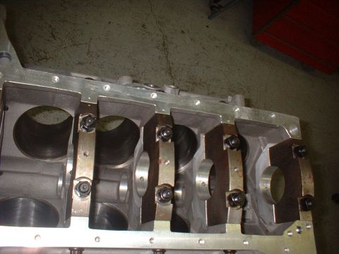 1965 Shelby Cobra - Close-up view of an engine block, showing the crankshaft bearing caps and cylinder bores.