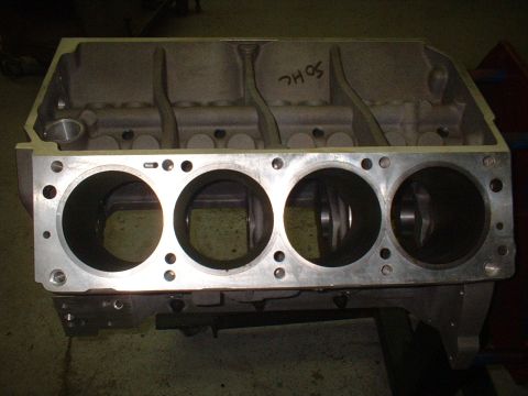 1965 Shelby Cobra - Aluminum engine block with four cylinder bores. Handwritten text 'SOHC' is visible on top.