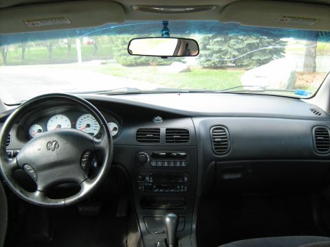 1988 Mercury Grand Marquis - Interior view of a car dashboard, showing the steering wheel, gauges, and center console. The Supermotors.net watermark is present.