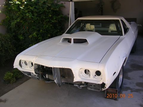 1972 Ford Ranchero - This 1972 Ford Ranchero is undergoing restoration, showing its front end with a prominent hood scoop.