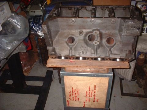 1964 Ford Galaxie - Engine block resting on a wooden crate with shipping information visible.
