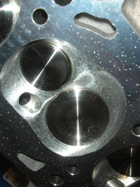 1992 Ford Crown Victoria - Engine cylinder head with intake and exhaust valves visible.