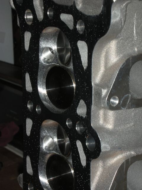 1992 Ford Crown Victoria - Close-up of an engine cylinder head gasket, showing its intricate design and material.