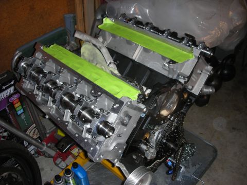 1992 Ford Crown Victoria - Close-up of an engine block during a rebuild, showing internal components and protective tape.