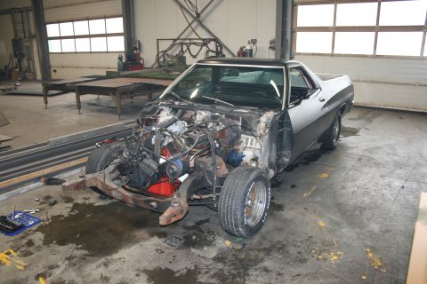 1973 Ford Ranchero - This Ford Ranchero is in a workshop, with its front end removed and engine exposed for repairs.