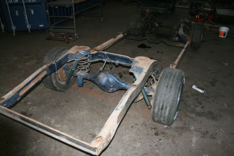 1973 Ford Ranchero - This is the frame and rear suspension assembly of a vehicle, likely undergoing restoration or repair.