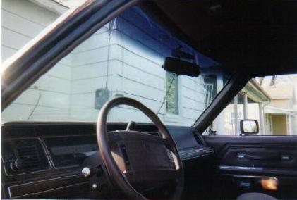 1990 Mercury Grand Marquis - Interior view of a 1990 Mercury Grand Marquis, showing the dashboard and steering wheel.