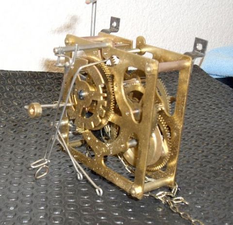 1978 Ford Bronco - This is a close-up of a clock's internal mechanism, showing gears and chains.