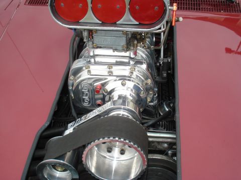 1994 Ford F-350 - Close-up of a chrome supercharger assembly with red air filters and a BDS Racing belt, likely part of a custom engine build.