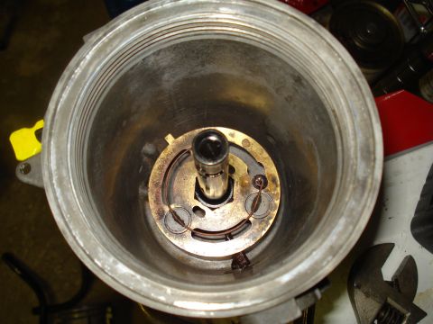 1994 Ford F-350 - Internal view of an engine part, possibly a distributor or oil pump component, showing brass and metal mechanisms.