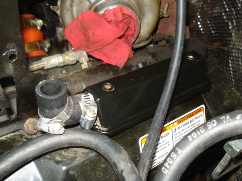 1994 Ford F-350 - Close-up of an engine compartment, focusing on a turbocharger and associated plumbing.