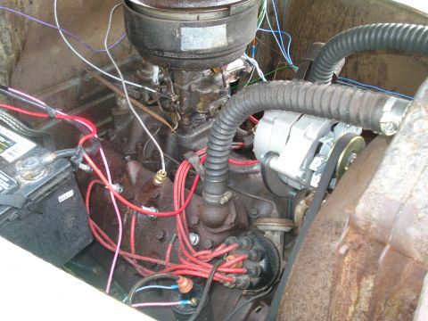 1994 Ford F-350 - Close-up view of an engine bay, showing various components and wiring.