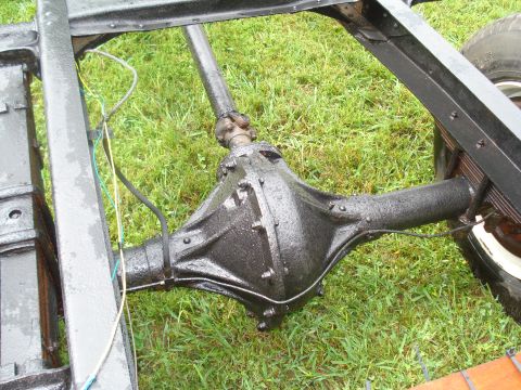 1994 Ford F-350 - Close-up view of a vehicle's rear axle and driveshaft, with a SuperMotors.net watermark visible.