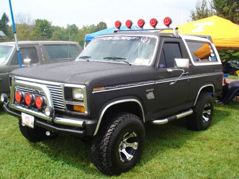 1994 Ford F-350 - This modified Ford Bronco has a custom front bumper and roof-mounted lights.