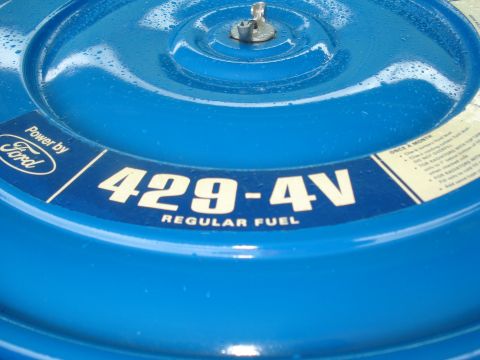 1994 Ford F-350 - Close-up of a blue engine air cleaner with "429-4V REGULAR FUEL" and "Power by Ford" labels.