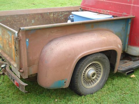 1994 Ford F-350 - This old pickup truck bed and fender show significant rust and wear.
